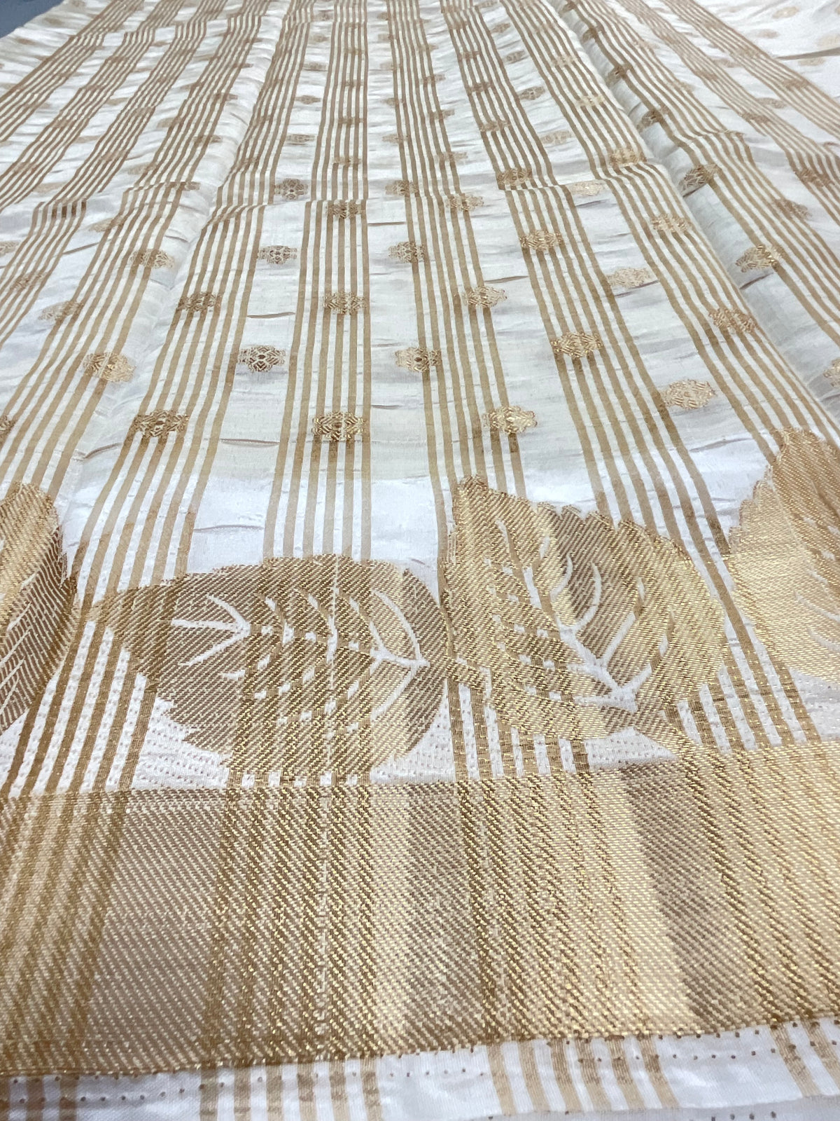 White and gold zari butti silk saree design 1