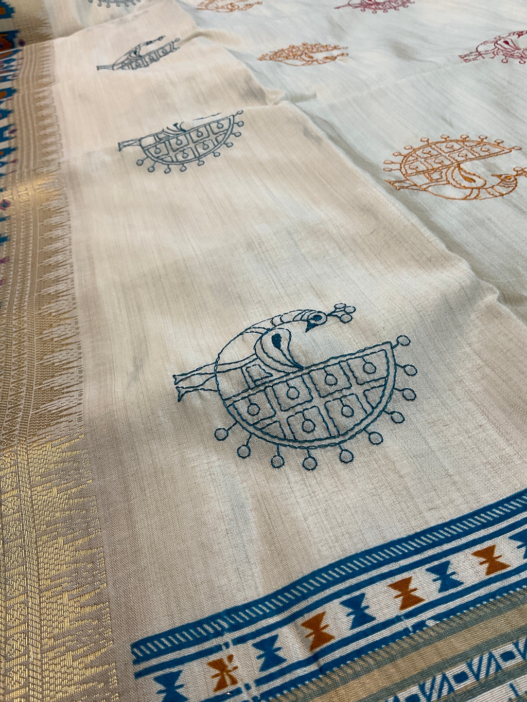 Hand embroidery, off white Pochampalli silk sari with threadwork , butti, and blue work pochampally Pallu with the designer blouse