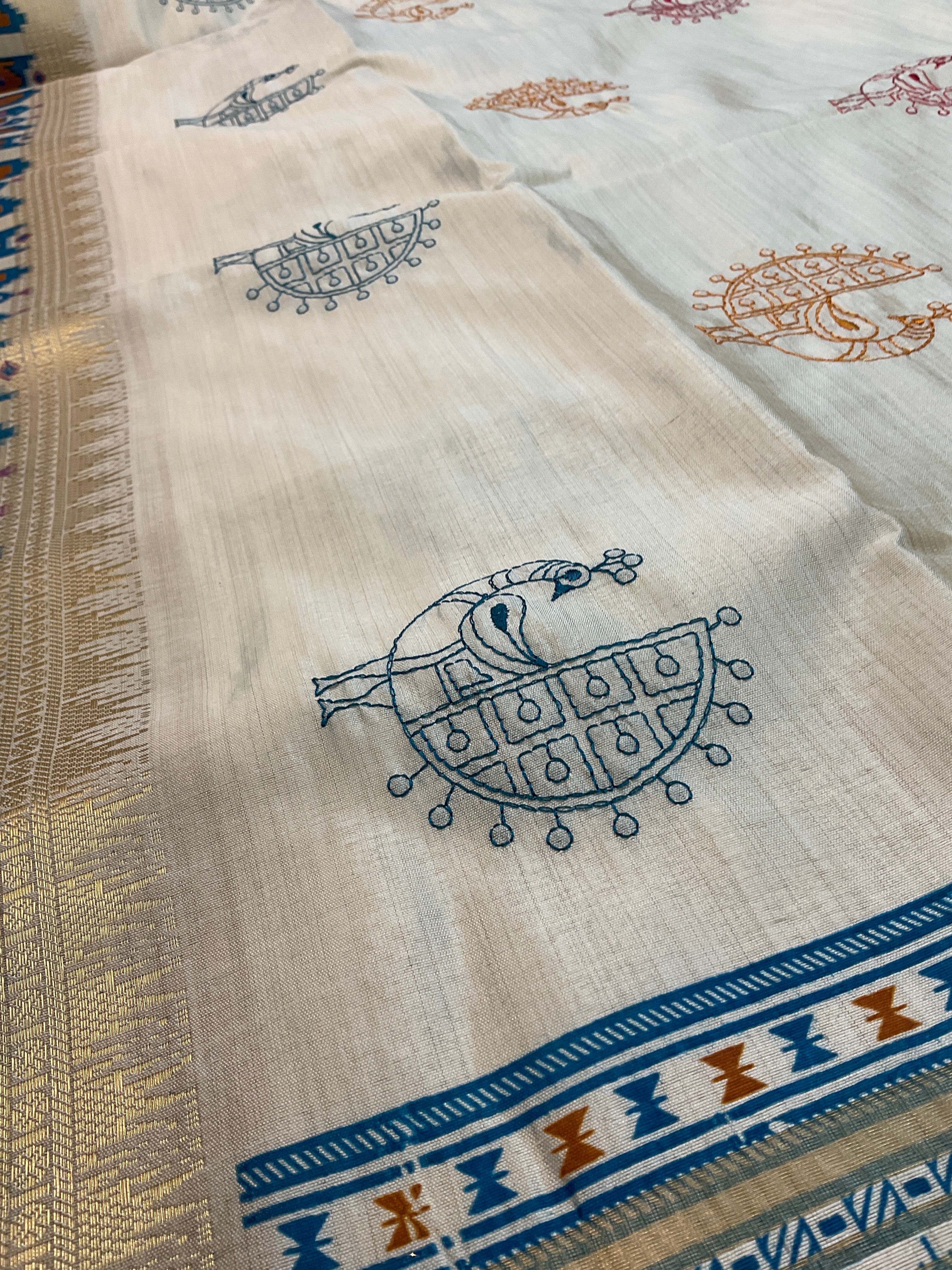 Hand embroidery, off white Pochampalli silk sari with threadwork , butti, and blue work pochampally Pallu with the designer blouse