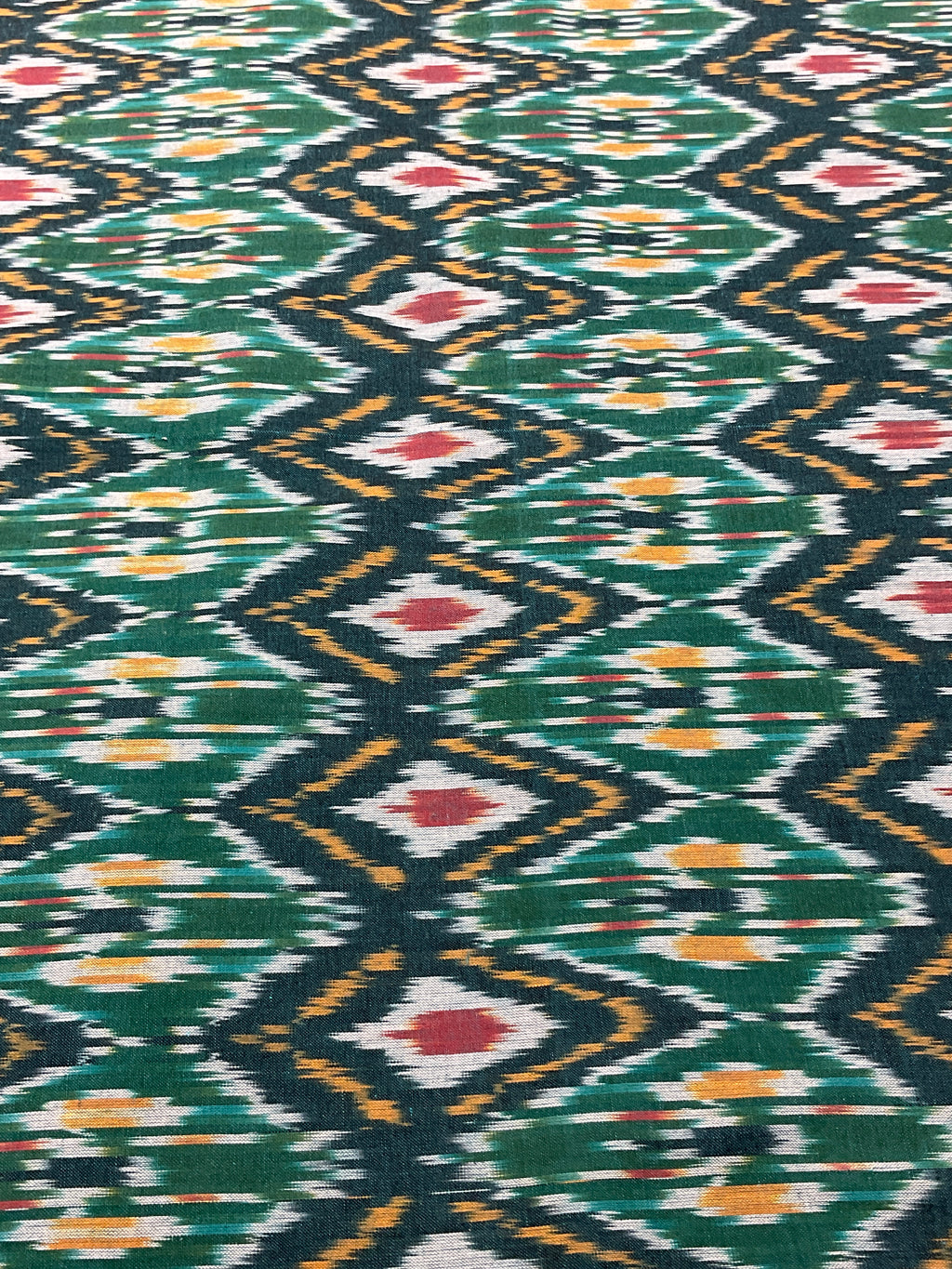 Multicolour Pochampally Ikkat Cotton Fabric – Green Base (Per Metre)