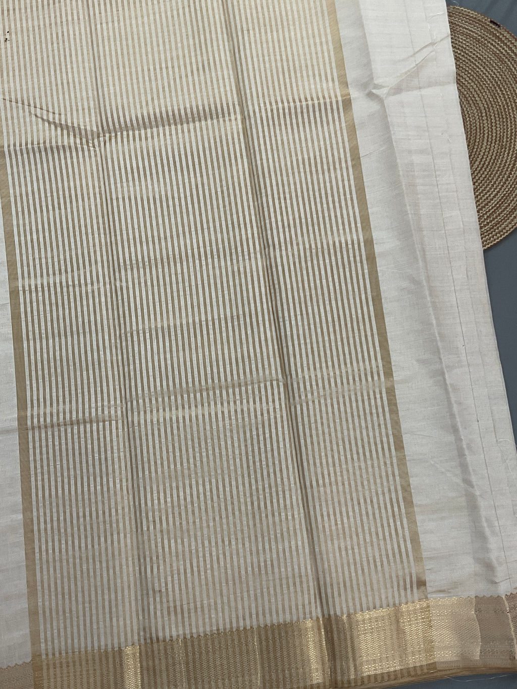 White and gold South Indian silk saree with zari pallu