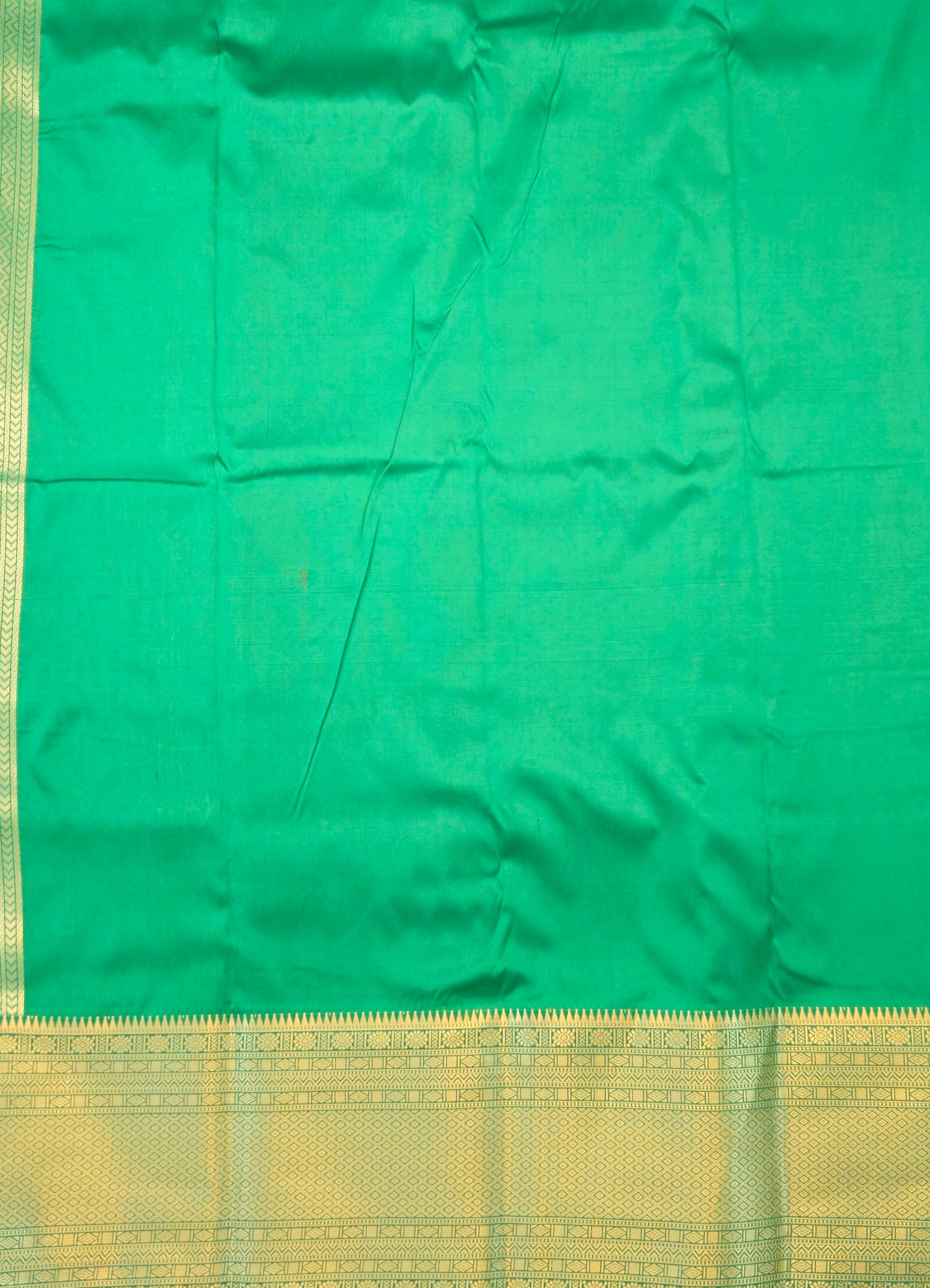 Kanchivaram golden line weaves saree in deep wine color with geometric weaves