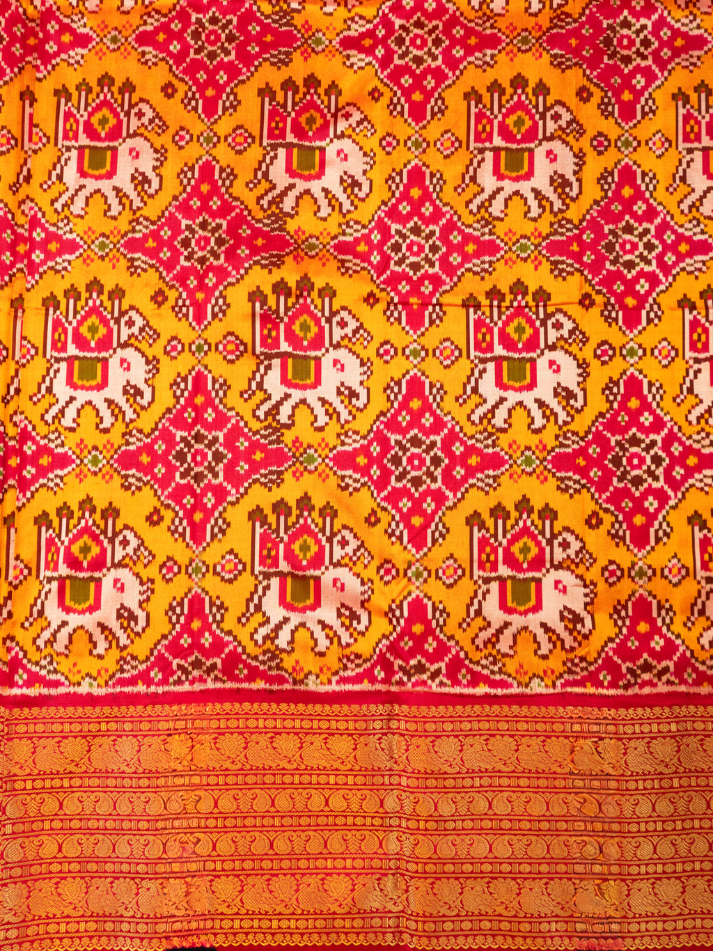 Pure Pochampally Ikat Silk Saree in Orange with Animal Motifs, Kanjivaram Border & Red Zari Pallu