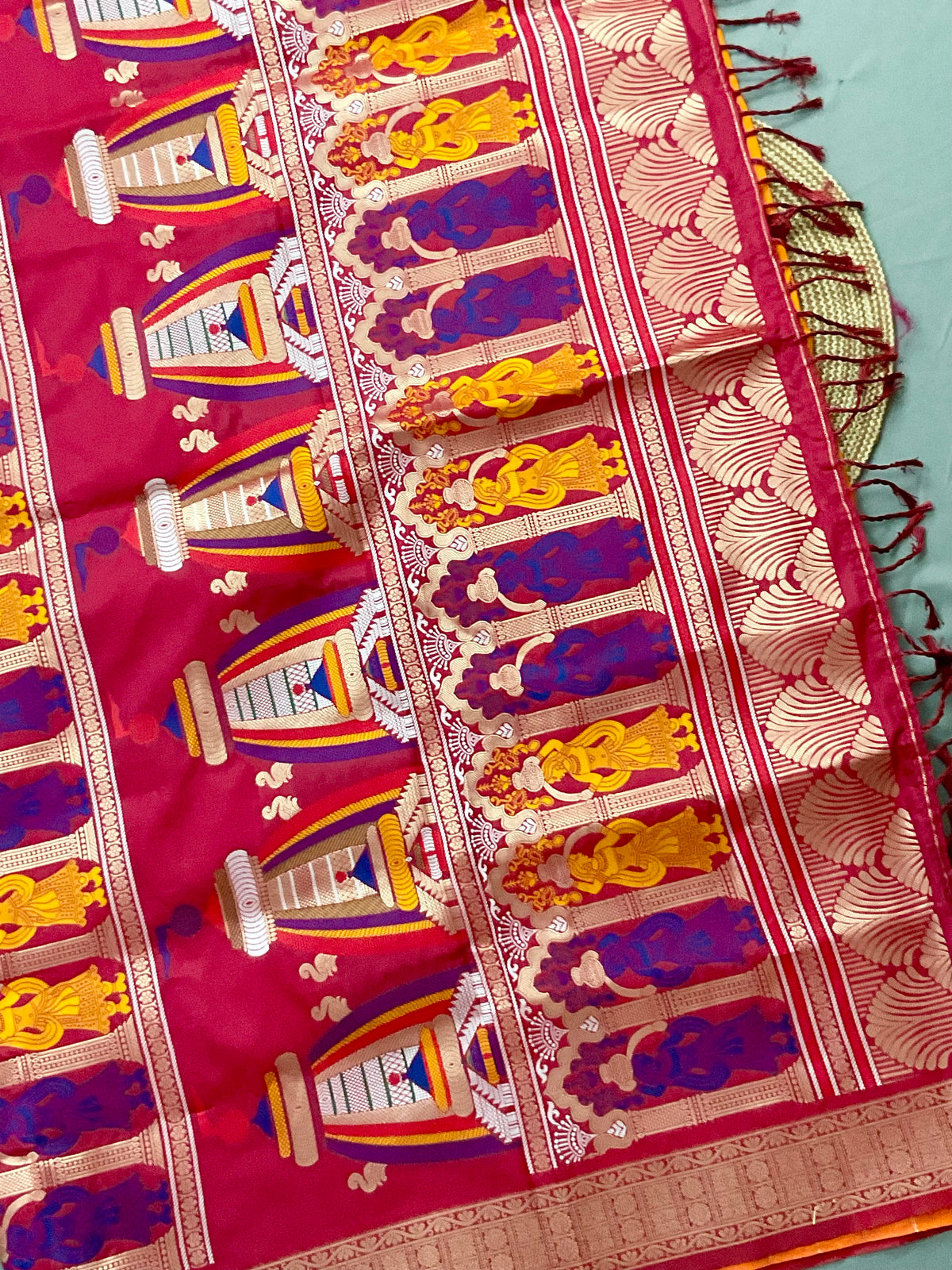Vibrant Orange Jamdani Silk Saree with Golden Temple Border and Tassels
