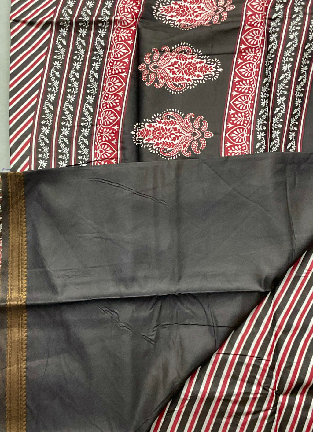 Kalamkari Leheriya Printed Soft Silk Saree in Black with Designer Pallu and Gold Border