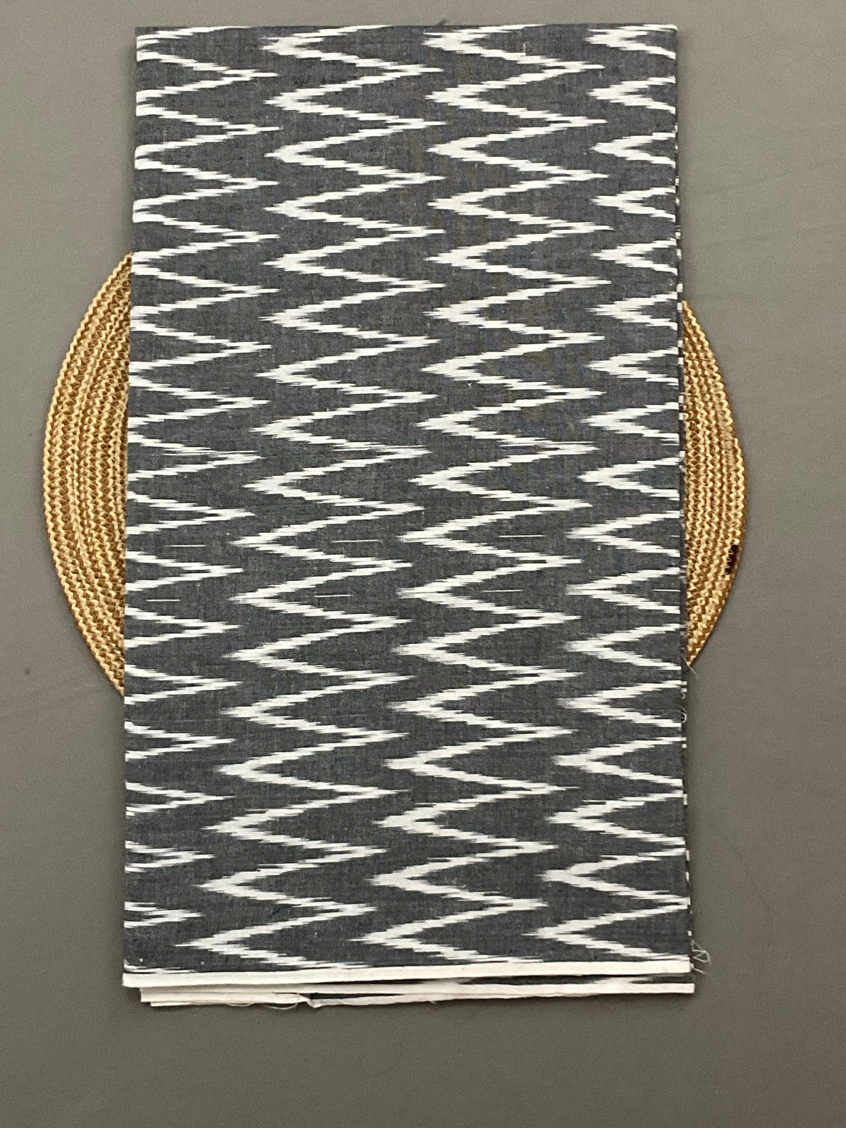 Grey and white Pochampally ikat handloom cotton top fabric close up