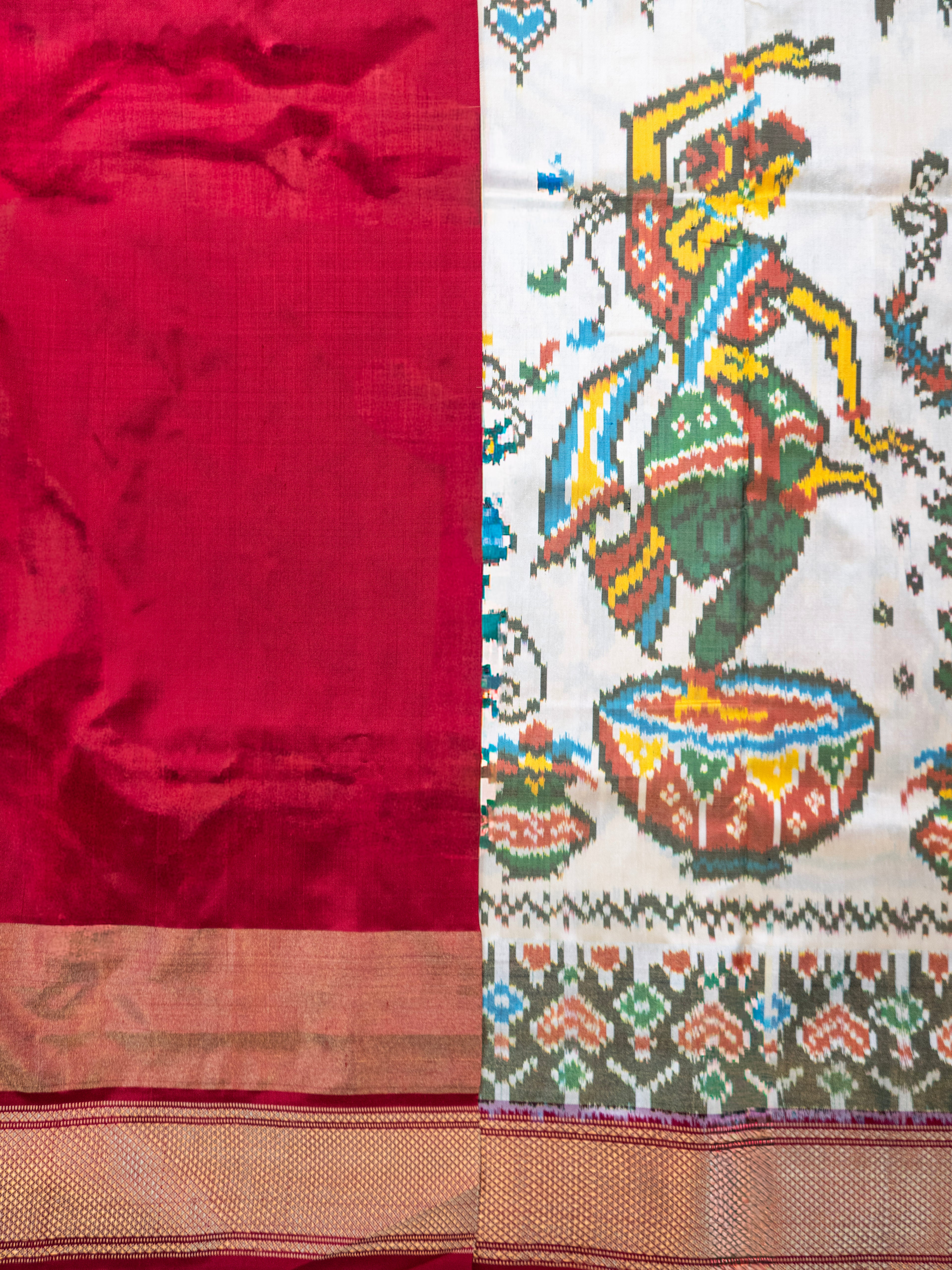 White Pochampally Animal Ikat Saree