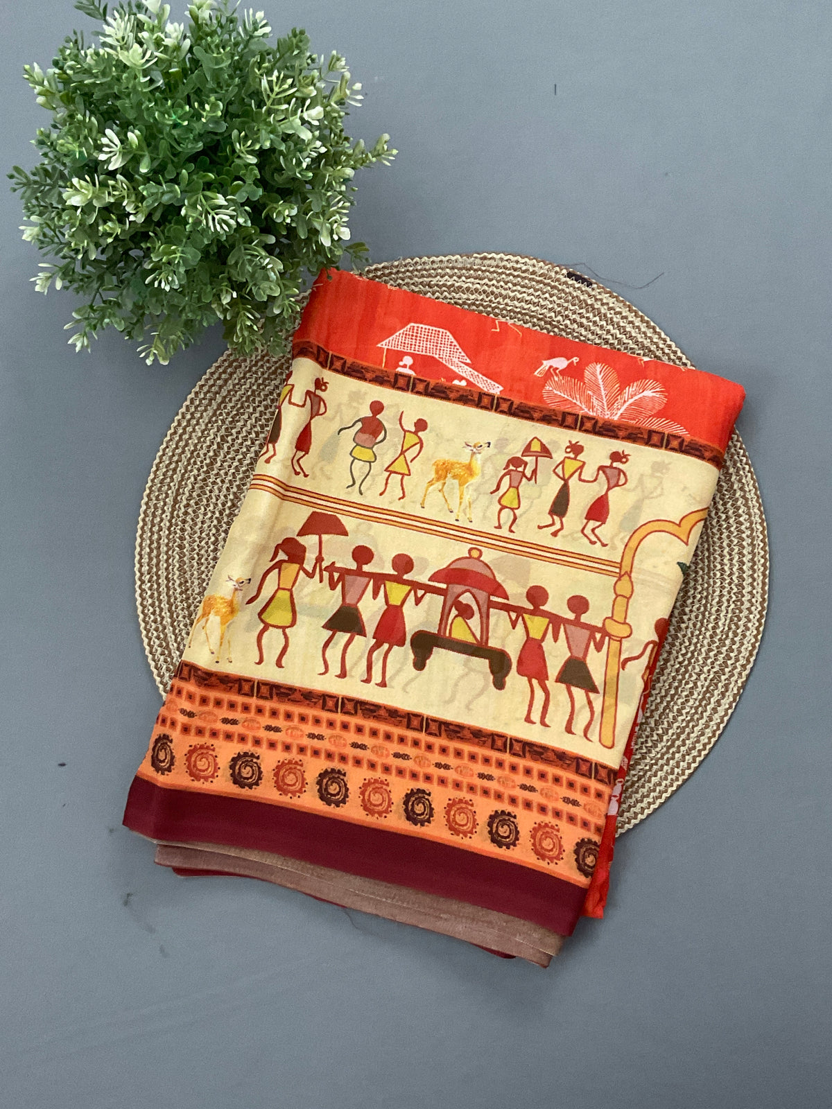 Orange Kalamkari Vareli printed georgette saree with printed border and designer pallu