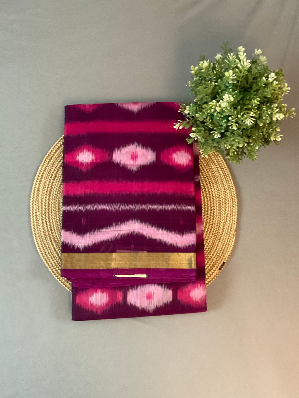Pochampally Sico Silk saree with pink and white colour with the black weaving Pallu and a plain blouse