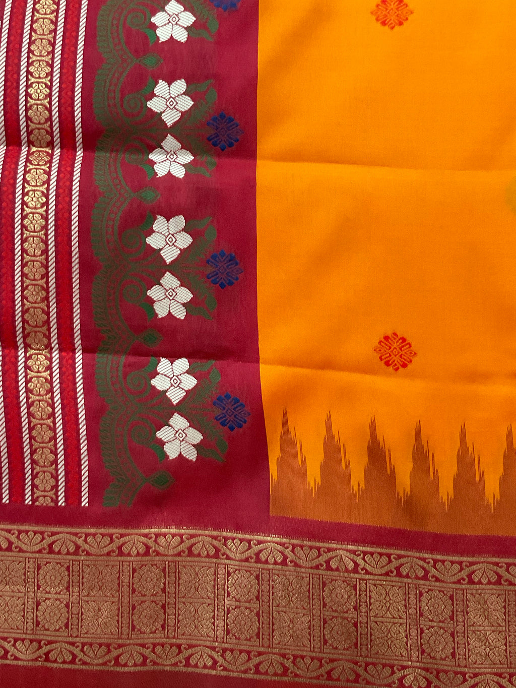 Vibrant Orange Jamdani Silk Saree with Golden Temple Border and Tassels