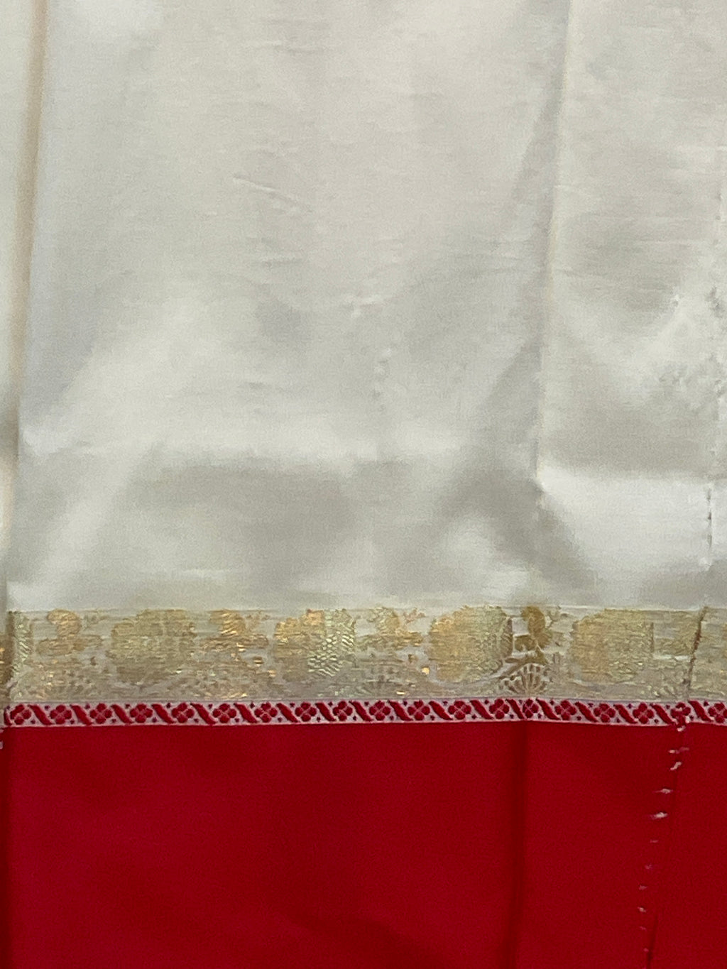 South Indian handloom silk saree with golden zari in a white and red colour contrast with plain blouse
