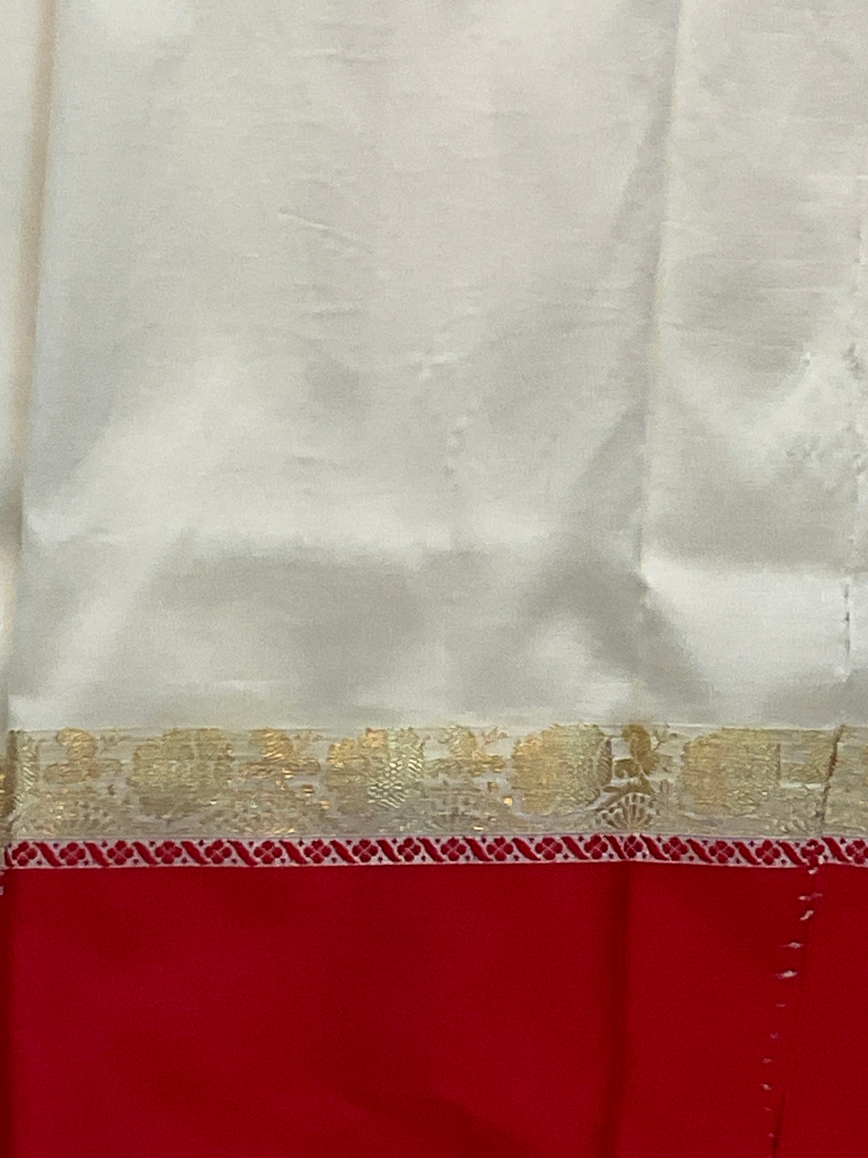 South Indian handloom silk saree with golden zari in a white and red colour contrast with plain blouse