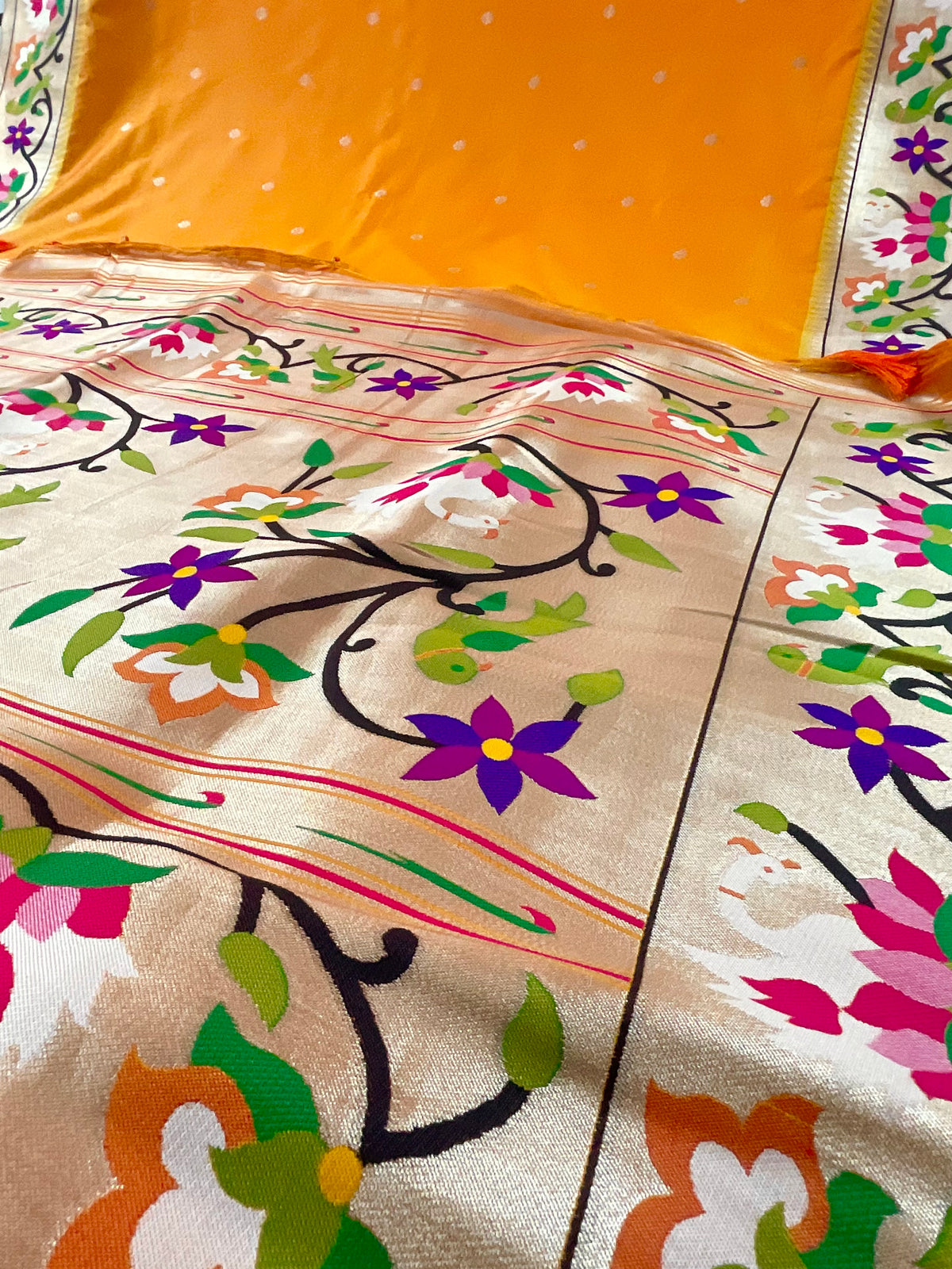 Orange Paithani saree with designer blouse