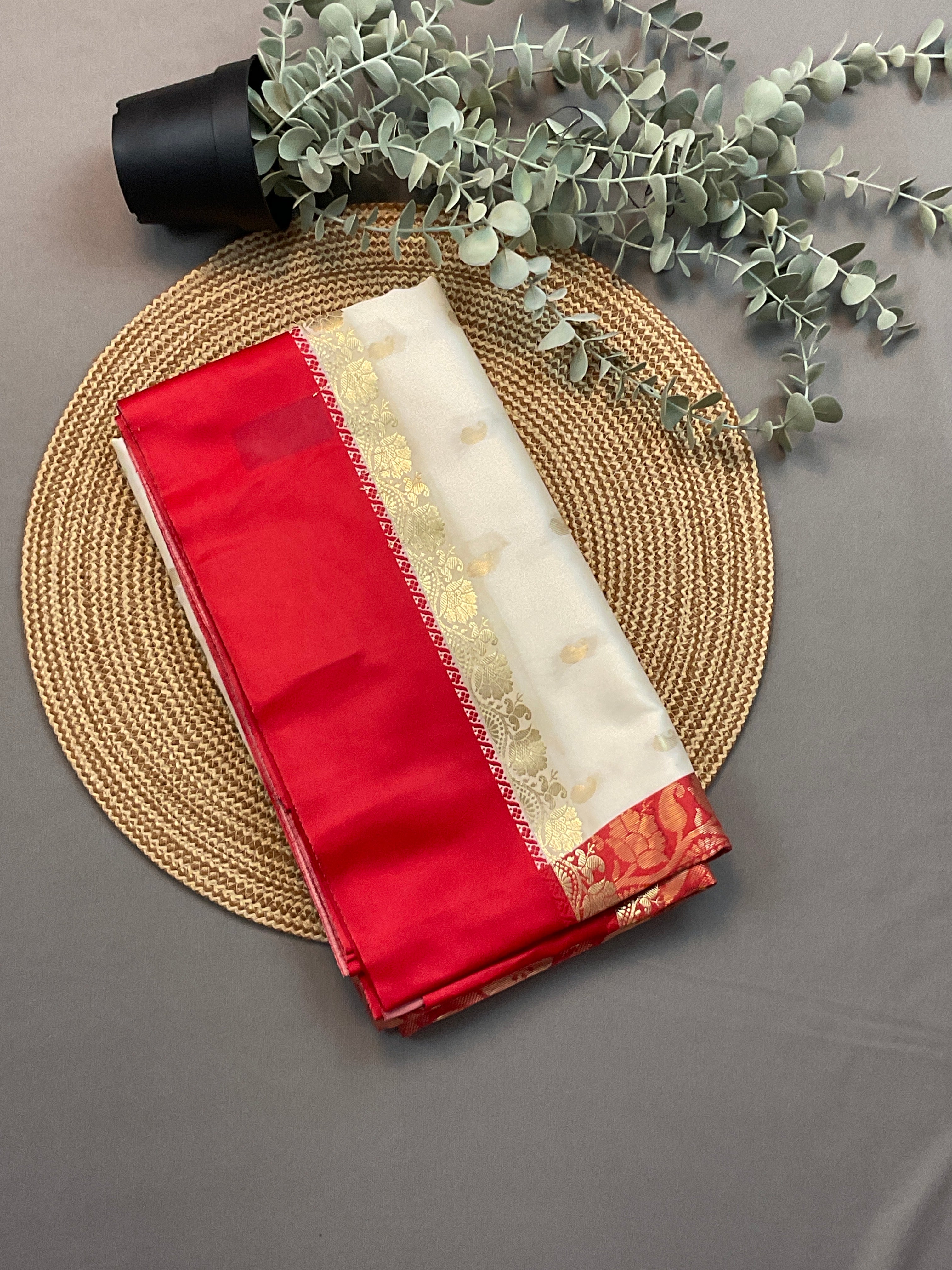 South Indian handloom silk saree with golden zari in a white and red colour contrast with plain blouse