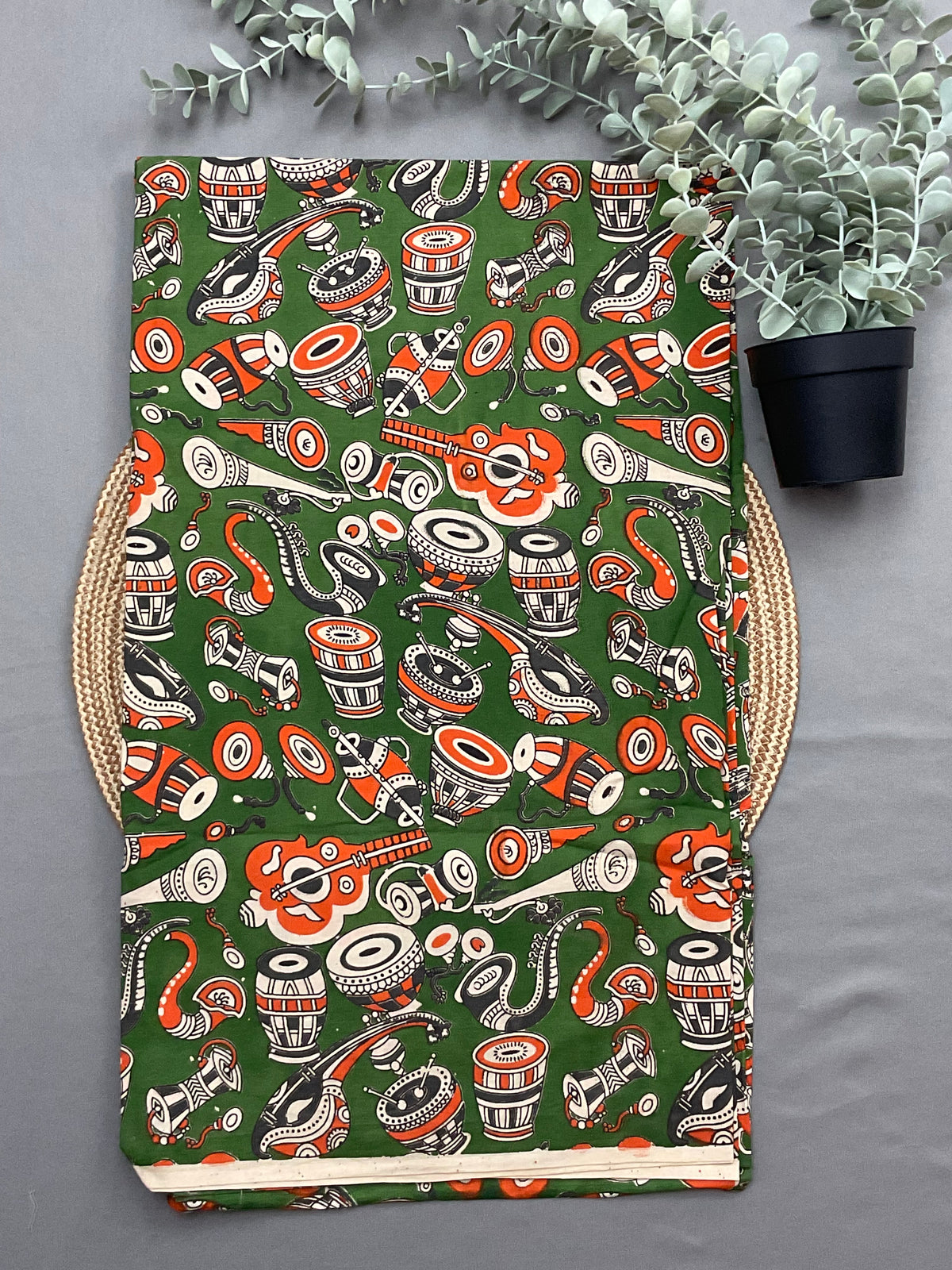 Green Kalamkari printed bottom fabric for orange ikkat suit set