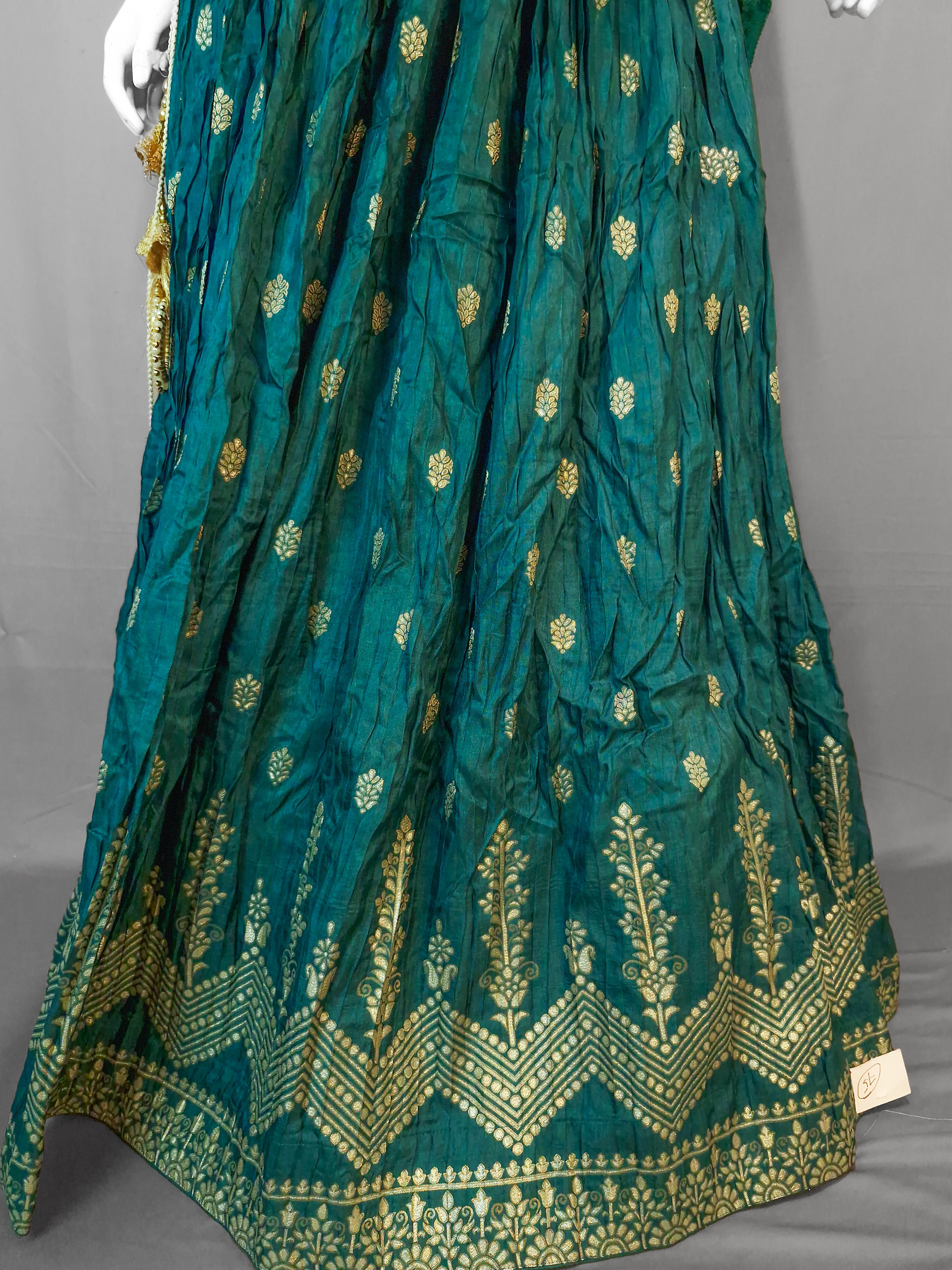 Peacock Green Handloom Silk Bridal Lehenga with Gold Zari Embroidery