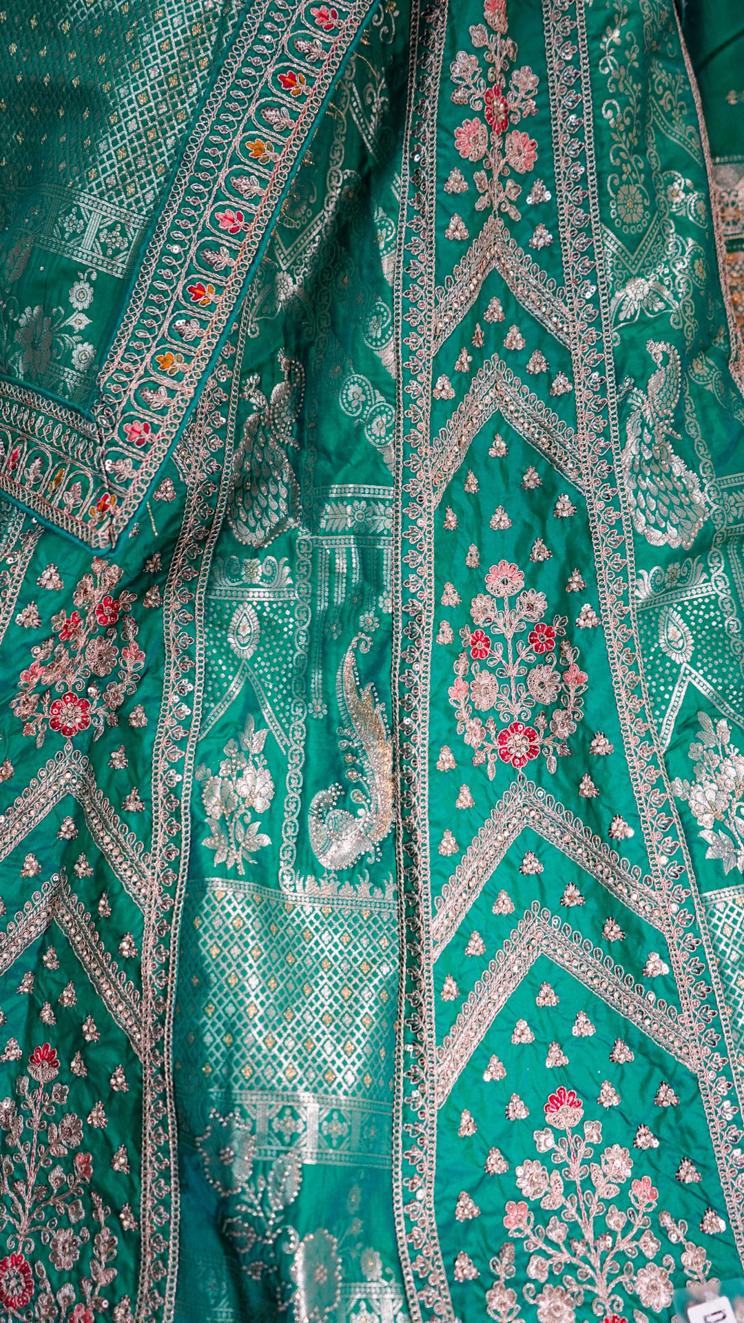 Emerald Green Handloom Silk Lehenga with Silver Zari Temple Weave
