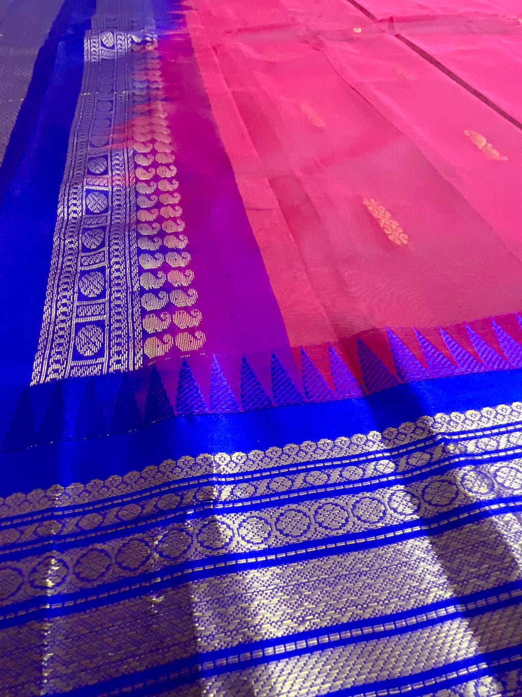 Red Gadwal silk saree with purple pallu, full drape view