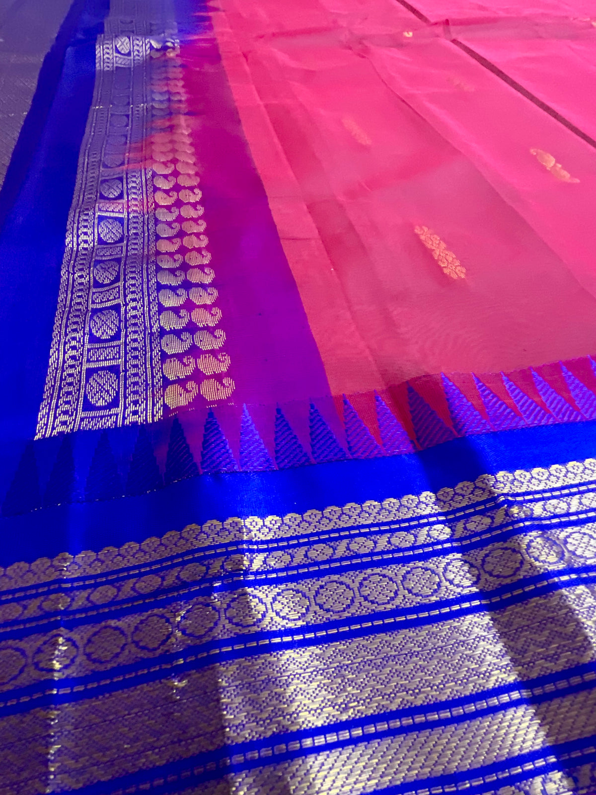 Red Gadwal silk saree with purple pallu, full drape view