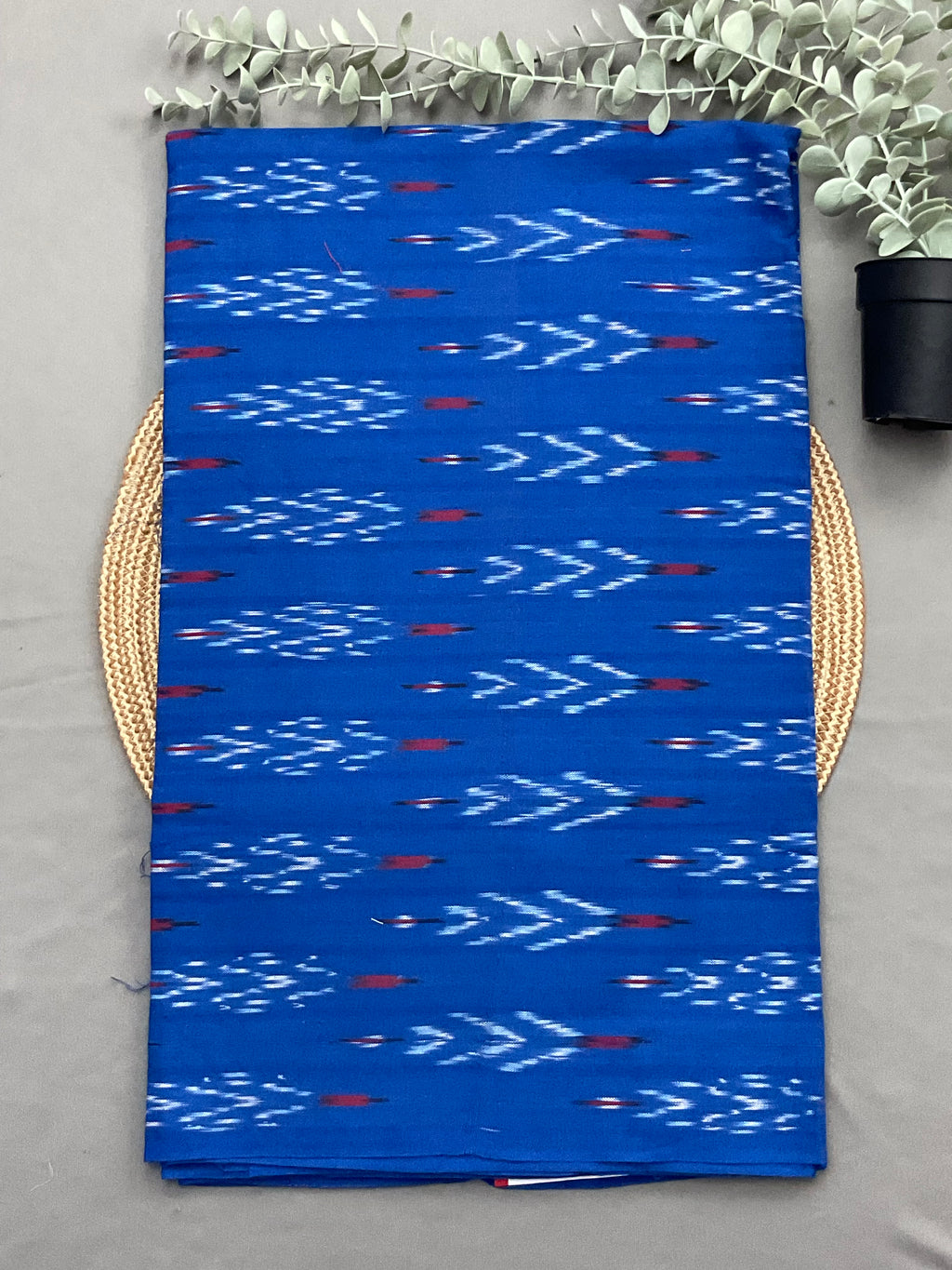Blue handwoven Pochampally ikkat cotton top fabric close up