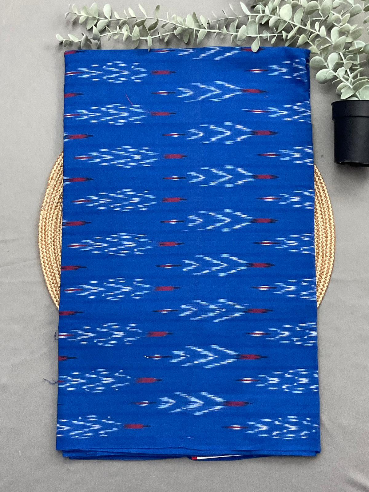 Blue handwoven Pochampally ikkat cotton top fabric close up