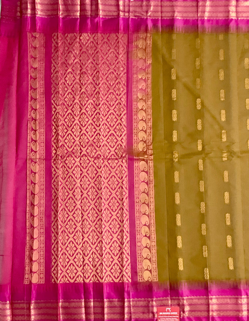 Draped mehendi green Gadwal silk saree with pink border