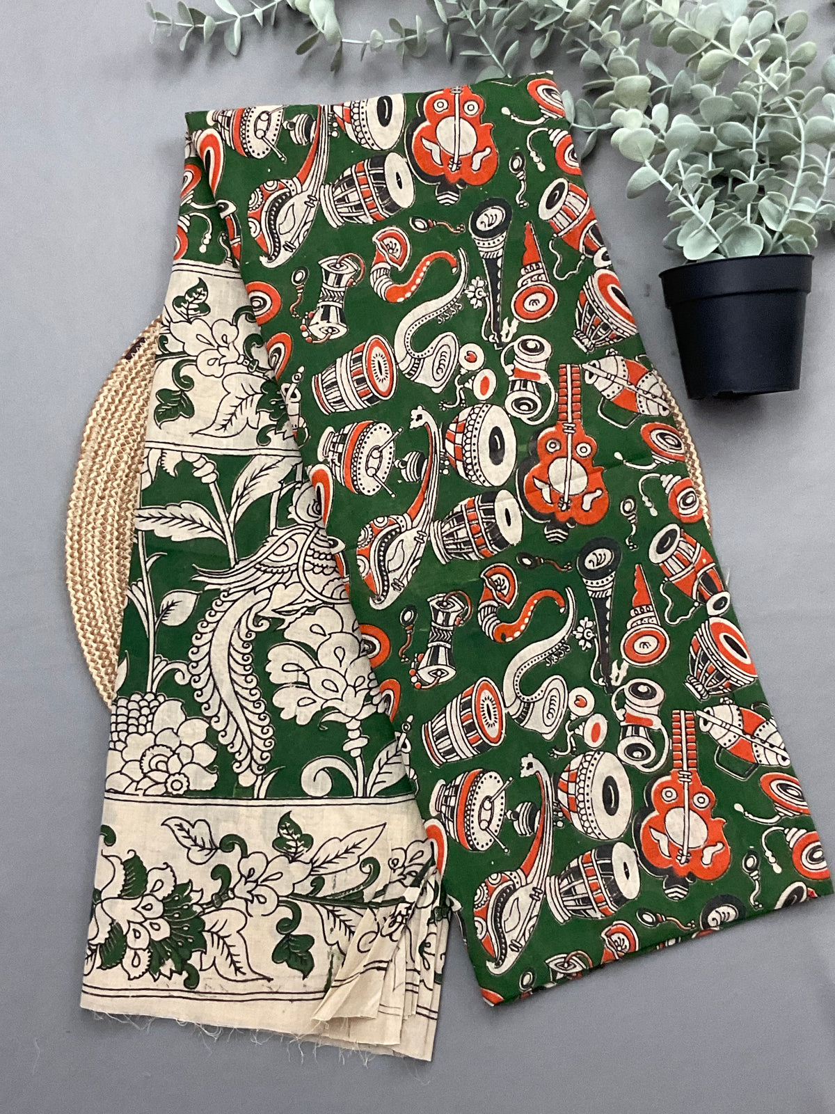 Green Kalamkari printed dupatta for orange ikkat dress material