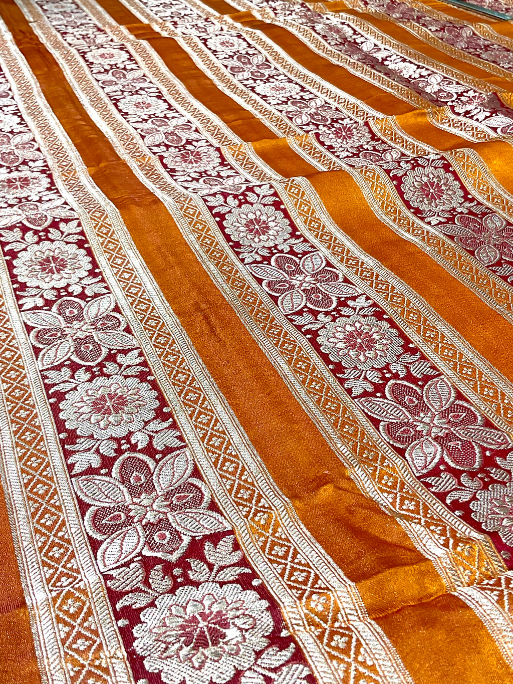 Orange Banarasi Handloom Silk Fabric with Red Stripes & Floral Weave (Per Metre)
