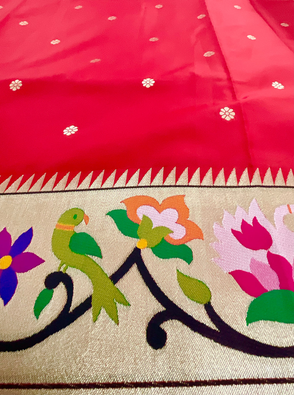 Red Paithani saree gold zari pallu close-up