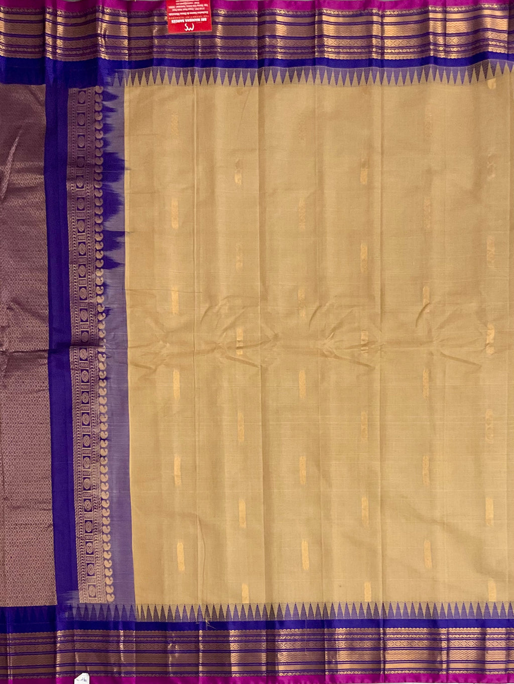 Violet zari contrast border detail on cream Gadwal silk saree