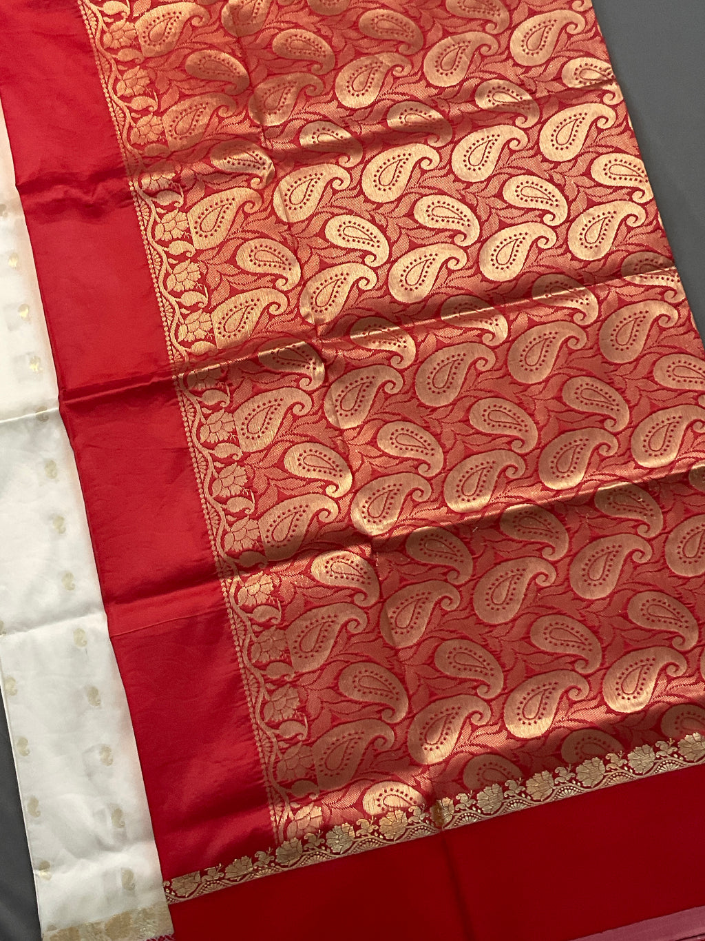 South Indian handloom silk saree with golden zari in a white and red colour contrast with plain blouse