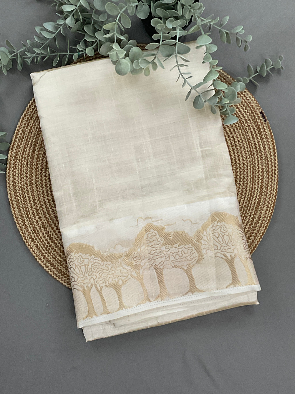 White and gold silk saree with designer border