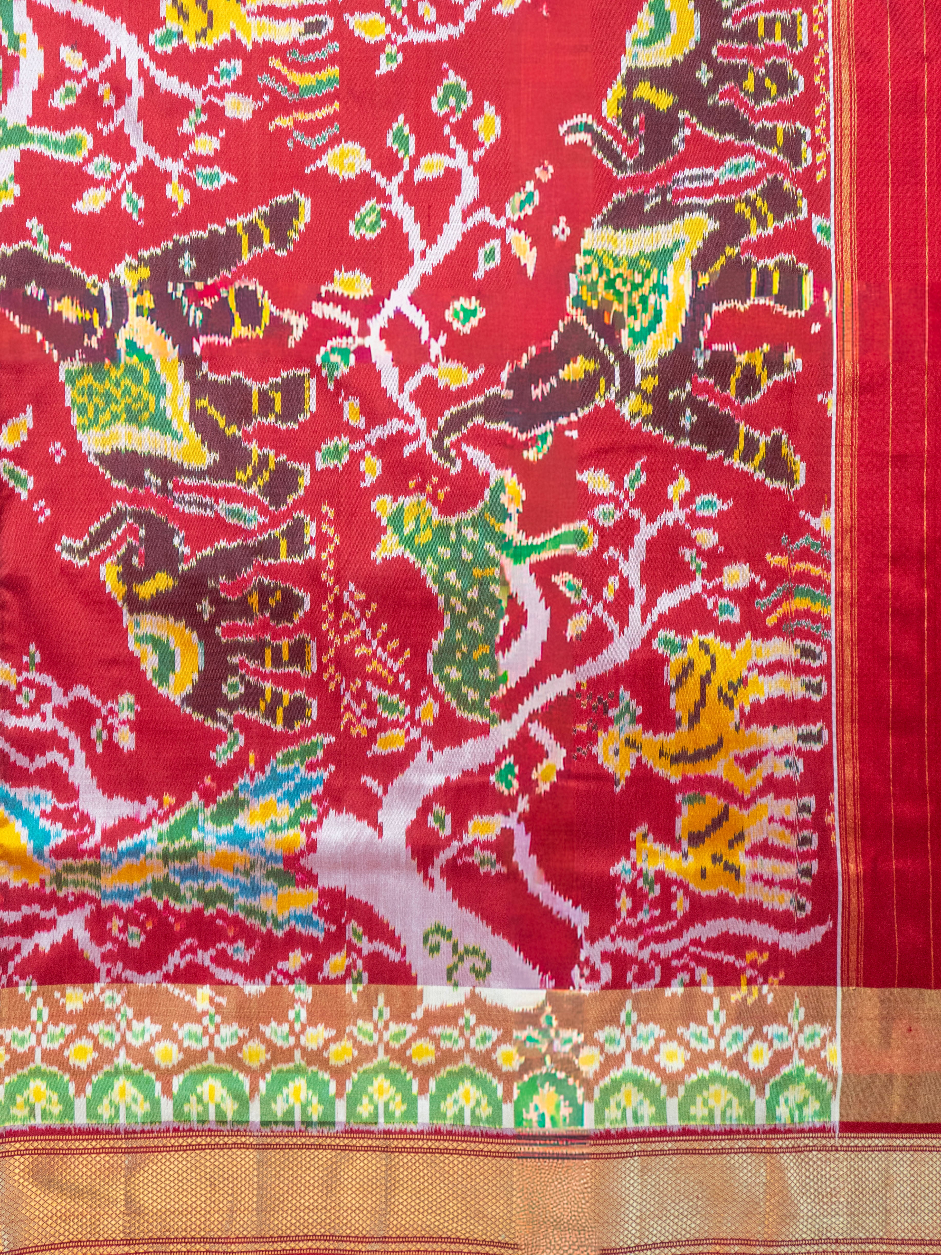 White Pochampally Animal Ikat Saree