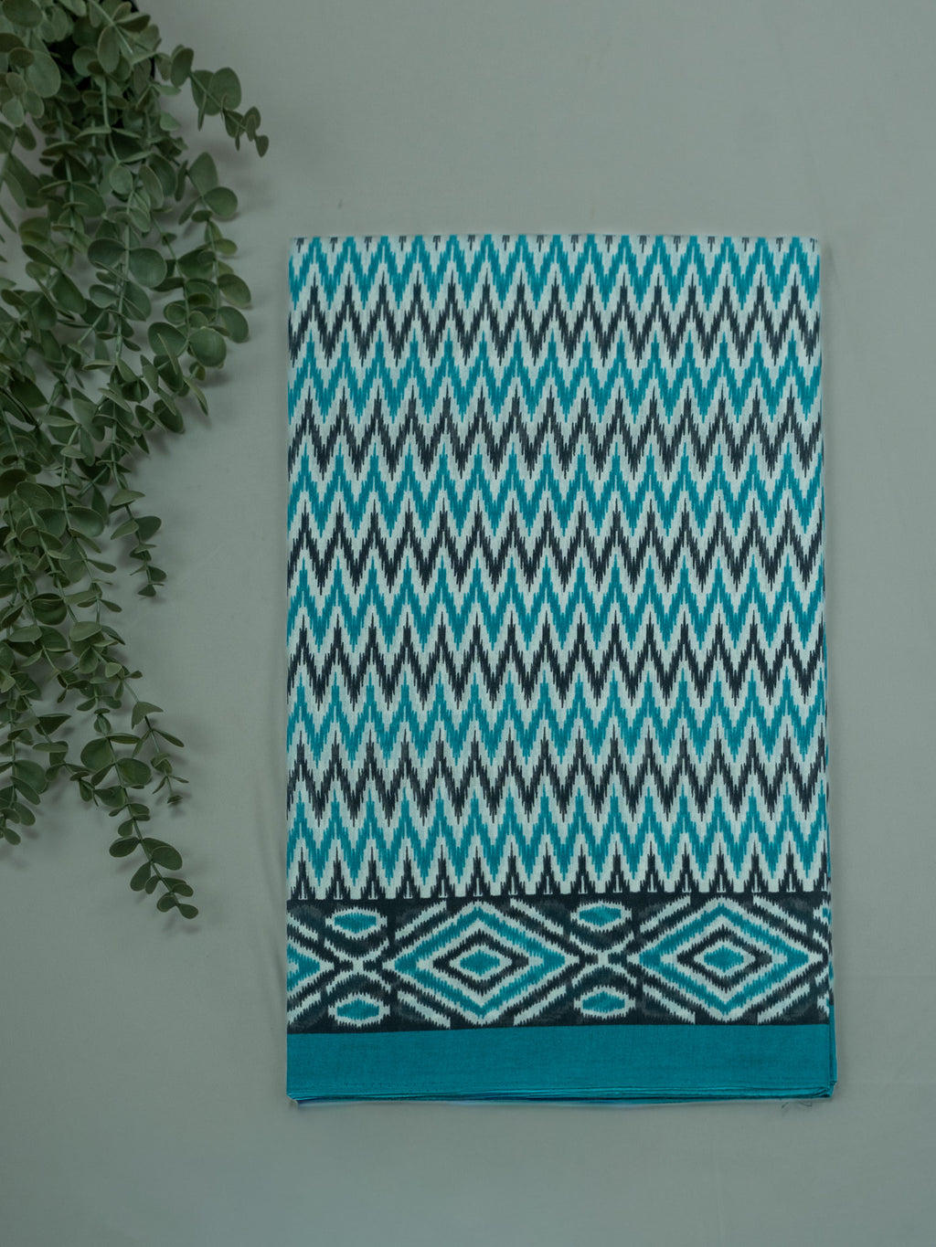 Turquoise Kalamkari Zig-Zag Cotton Saree with Navy Border