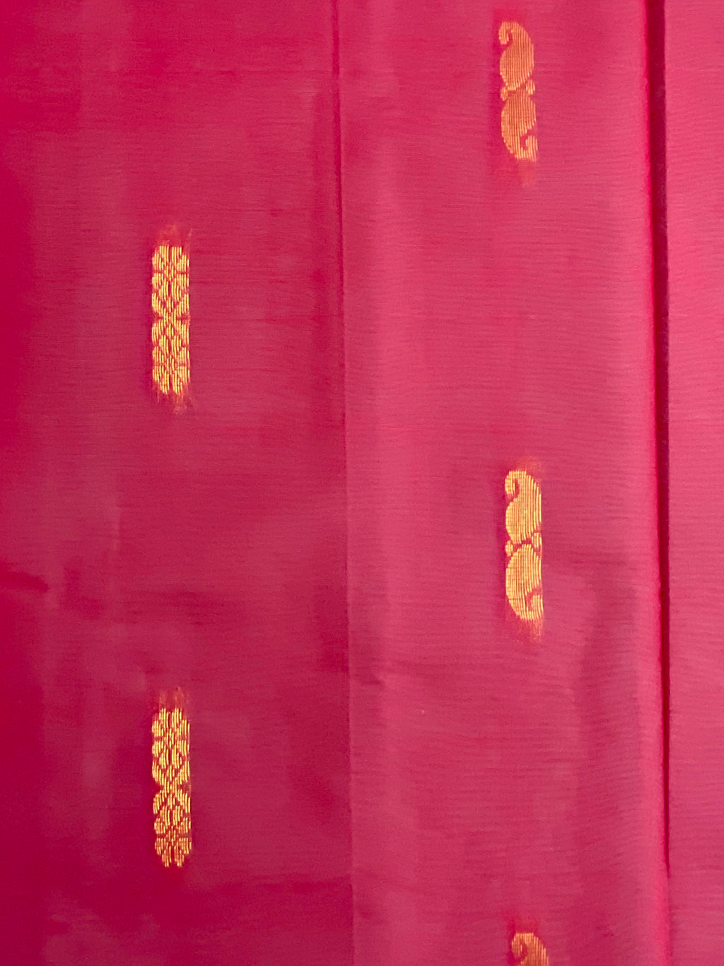 Purple zari contrast border of the red Gadwal silk saree