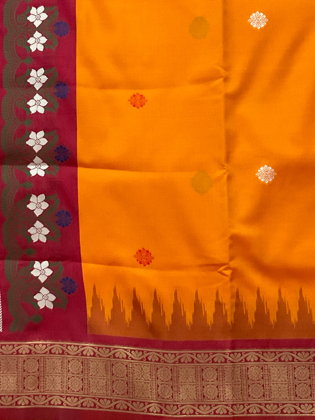 Vibrant Orange Jamdani Silk Saree with Golden Temple Border and Tassels
