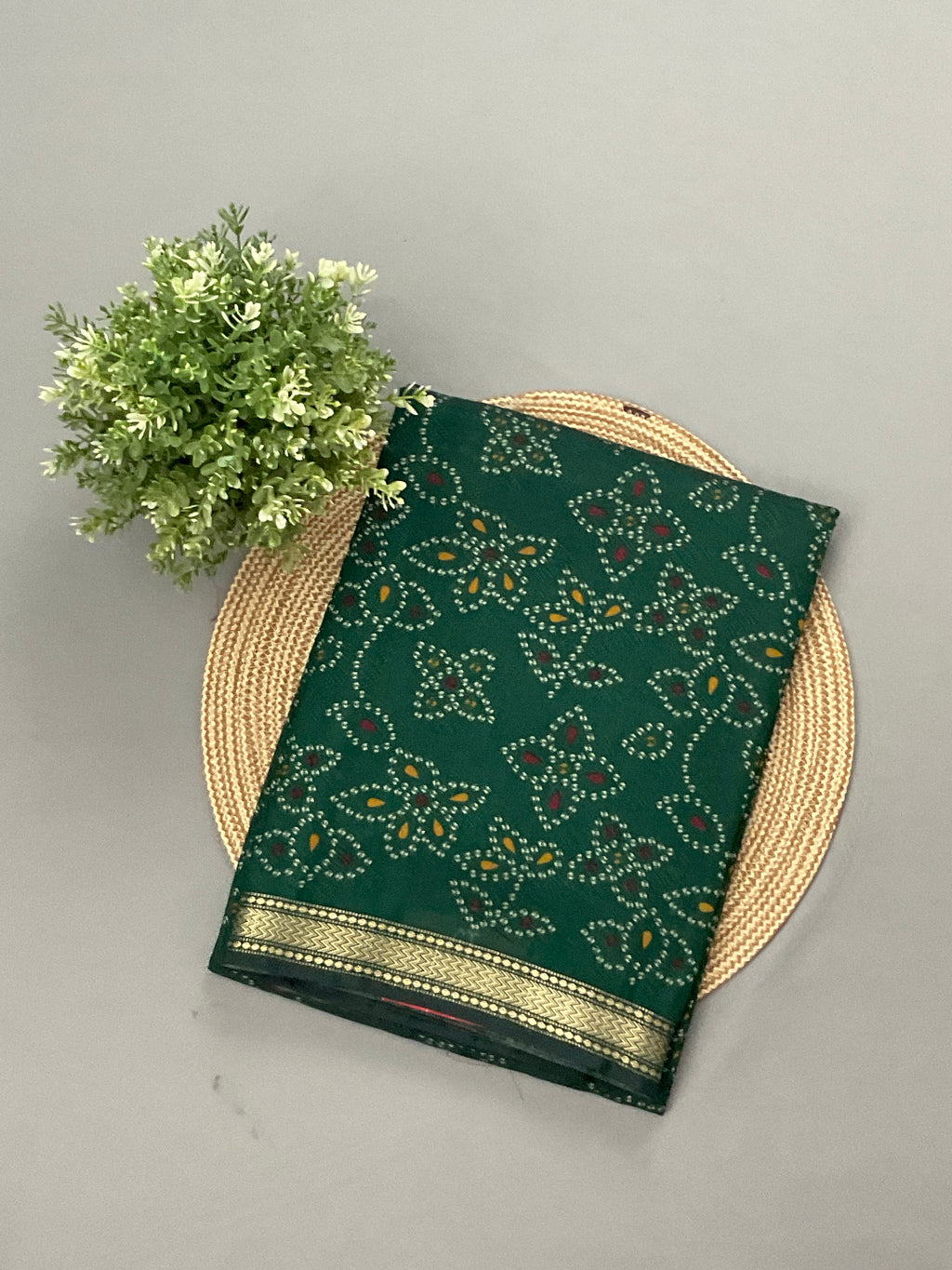 Bottle green Bandini printed georgette saree with golden weaving border and designer pallu