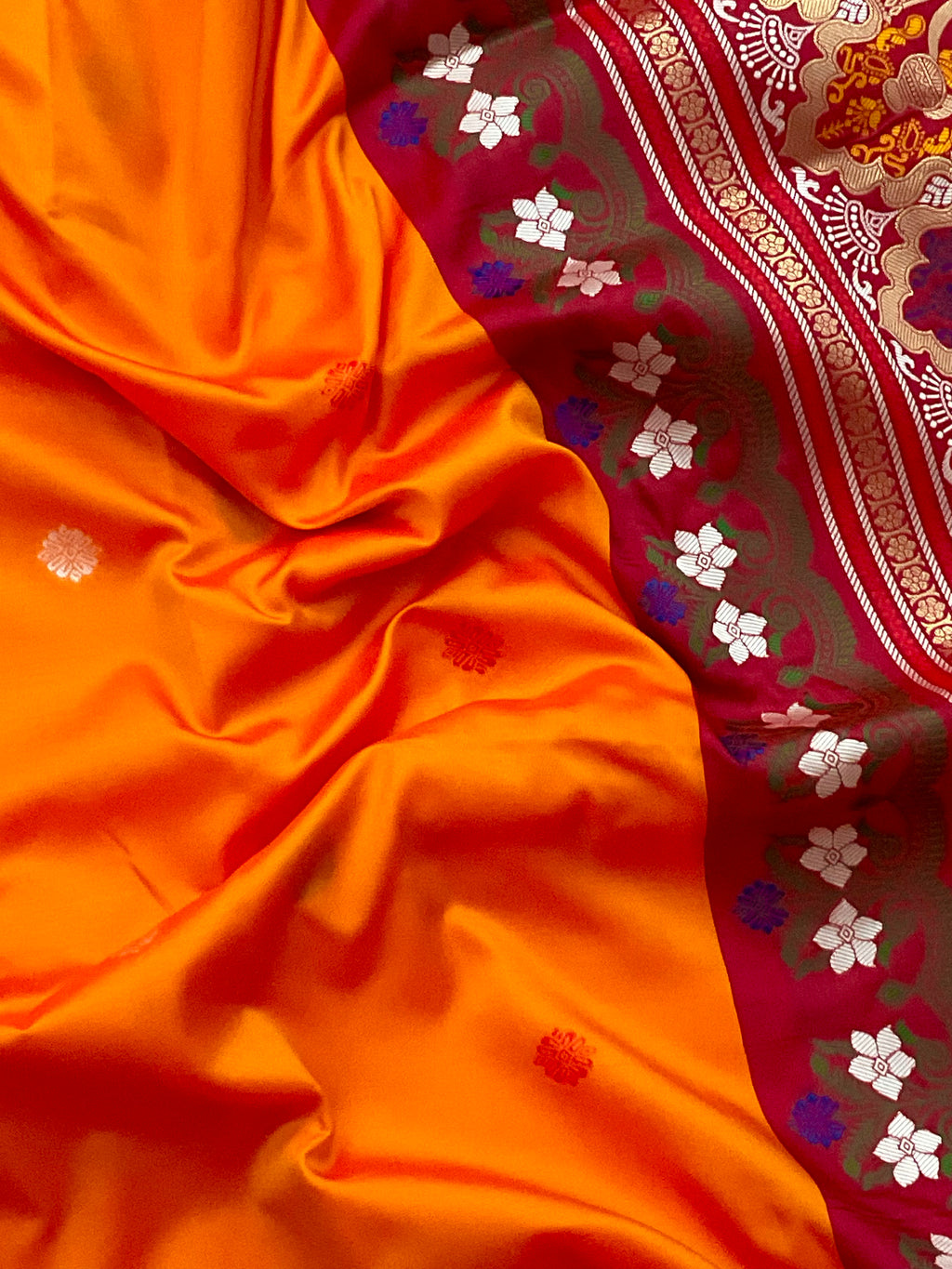 Vibrant Orange Jamdani Silk Saree with Golden Temple Border and Tassels