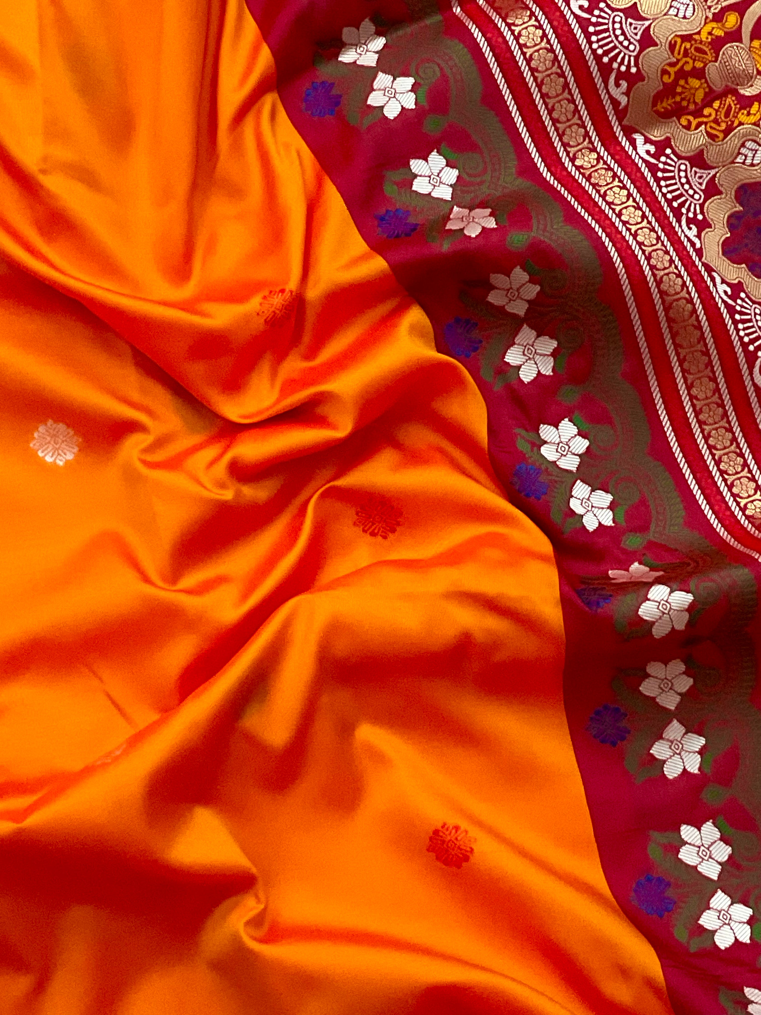 Vibrant Orange Jamdani Silk Saree with Golden Temple Border and Tassels