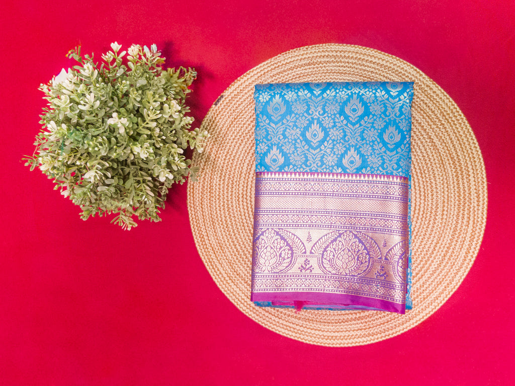 Kanchivaram gold brocrade saree in blue color with contrast blouse