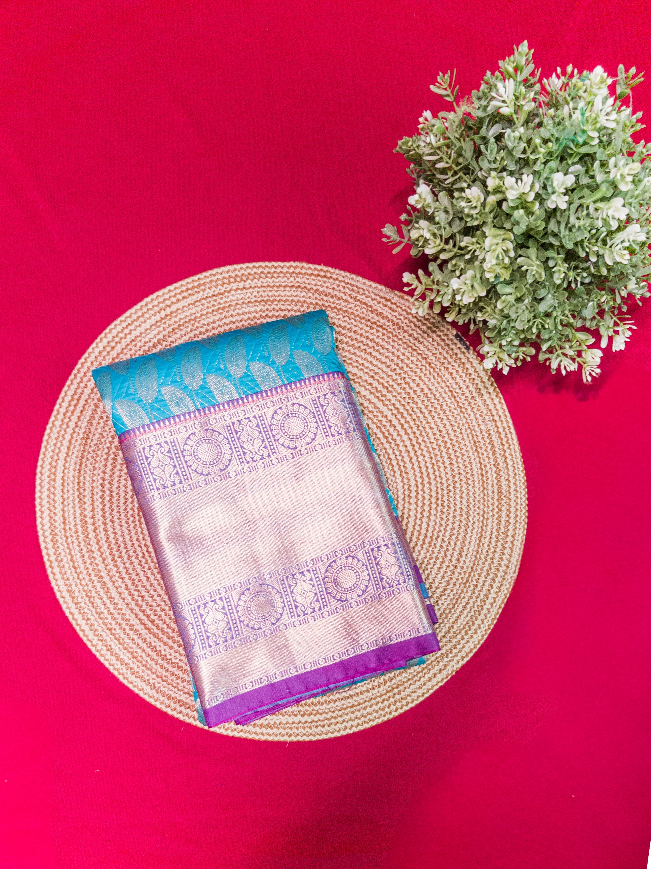 Kanchivaram golden leaf weave saree in sky blue color with pattu border