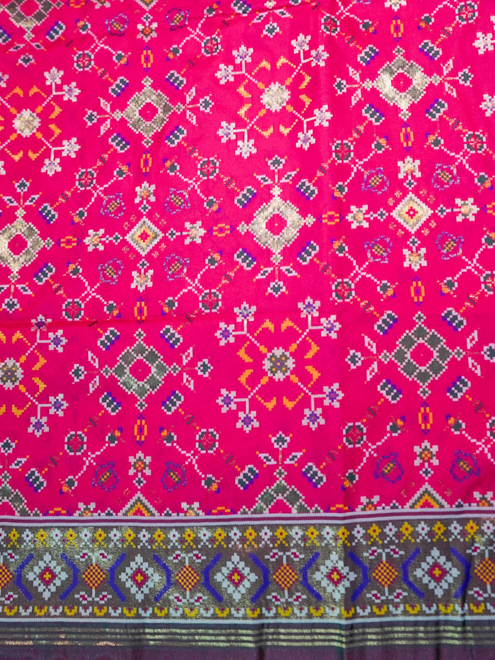 Rani pink patola silk saree body