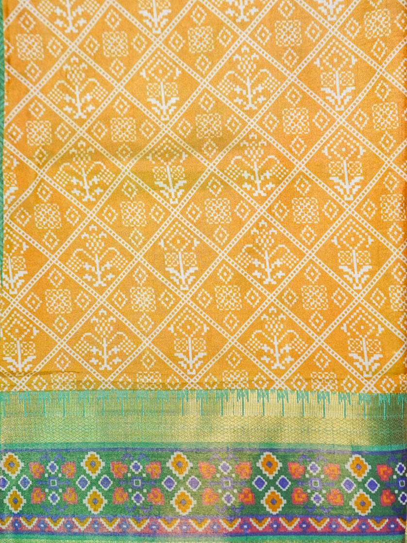 Yellow gold patola silk saree