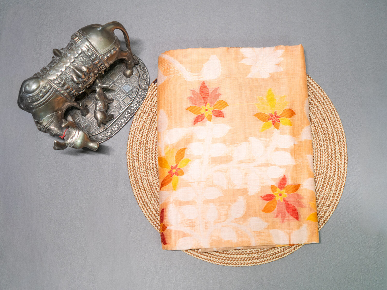 Peach tie-dye silk saree